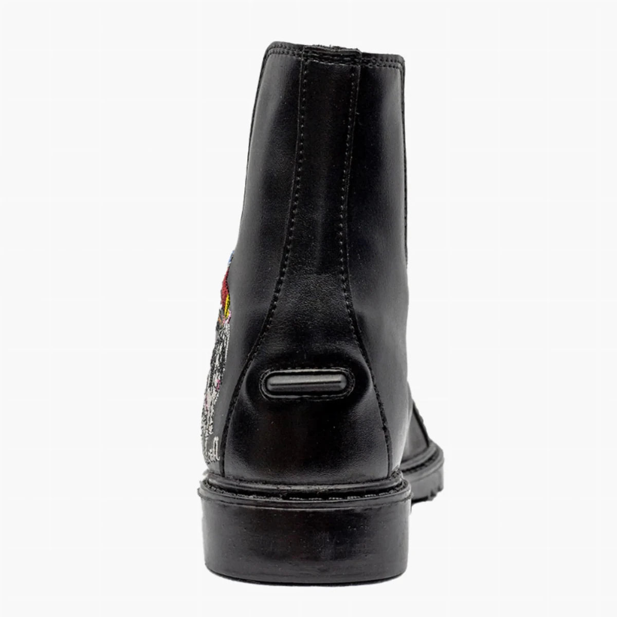TuffRider Children's Thelwell Sweep Front Zip Paddock Boots shown from back with black smooth finish and heel detail