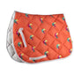 Lettia Toucan All Purpose Pad with bright orange quilted fabric and colorful toucan bird pattern for pet use