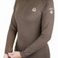 Woman wearing a brown Lettia Women Quarter-Zip Neck UPF 50+ Sun Shirt adjusting the cuff on a white background