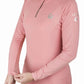 Woman wearing a pink Lettia Women Quarter-Zip Neck UPF 50+ Sun Shirt adjusting her sleeve, smiling downwards