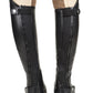 Lettia Adult London Leather Half Chaps in black leather, shown from the back on a rider’s legs with beige pants.