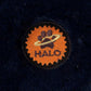 Close-up of a halo patch on the dark plush material of the Rectangular Dog Bed - Plush Cushioned Bed with Removable Washable Cover