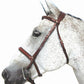 White horse wearing Henri de Rivel Pro Mono Crown Padded Bridle - Premium Comfort English Bridle with Laced Reins