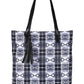 AWST Intl Snaffle Bit Tote Bag with Tassel featuring black and white check pattern and leather handles for pet supplies storage.