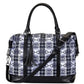 AWST Int'l Snaffle Bit Pattern Travel Bag with Tassel in black and white plaid pattern with leather handles and strap