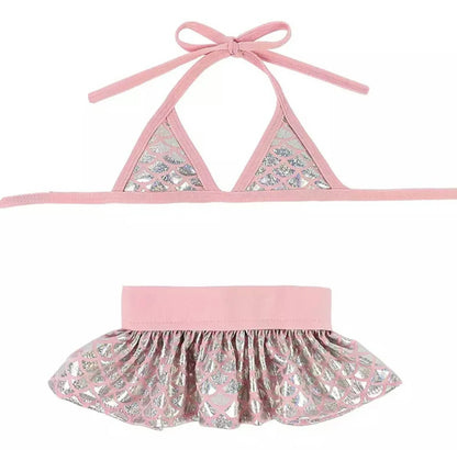 Bark Fifth Ave. Bikini Set in pink with silver mermaid scale pattern, featuring a halter top and ruffled skirt design