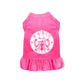 Pink pet dress with ruffled hem featuring a BASIC WITCH logo and witch illustration for pet supplies.