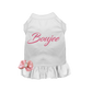 White pet dress with pink Boujee text, ruffled skirt, and pink bow accessory for stylish pet supplies.