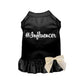 Black #Influencer Dress pet outfit with ruffled hem and cream bow accent, stylish and comfortable for pets.