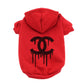 Red dog hoodie with black dripping logo design, part of Chewnel Drippy Dog Hoodies collection.