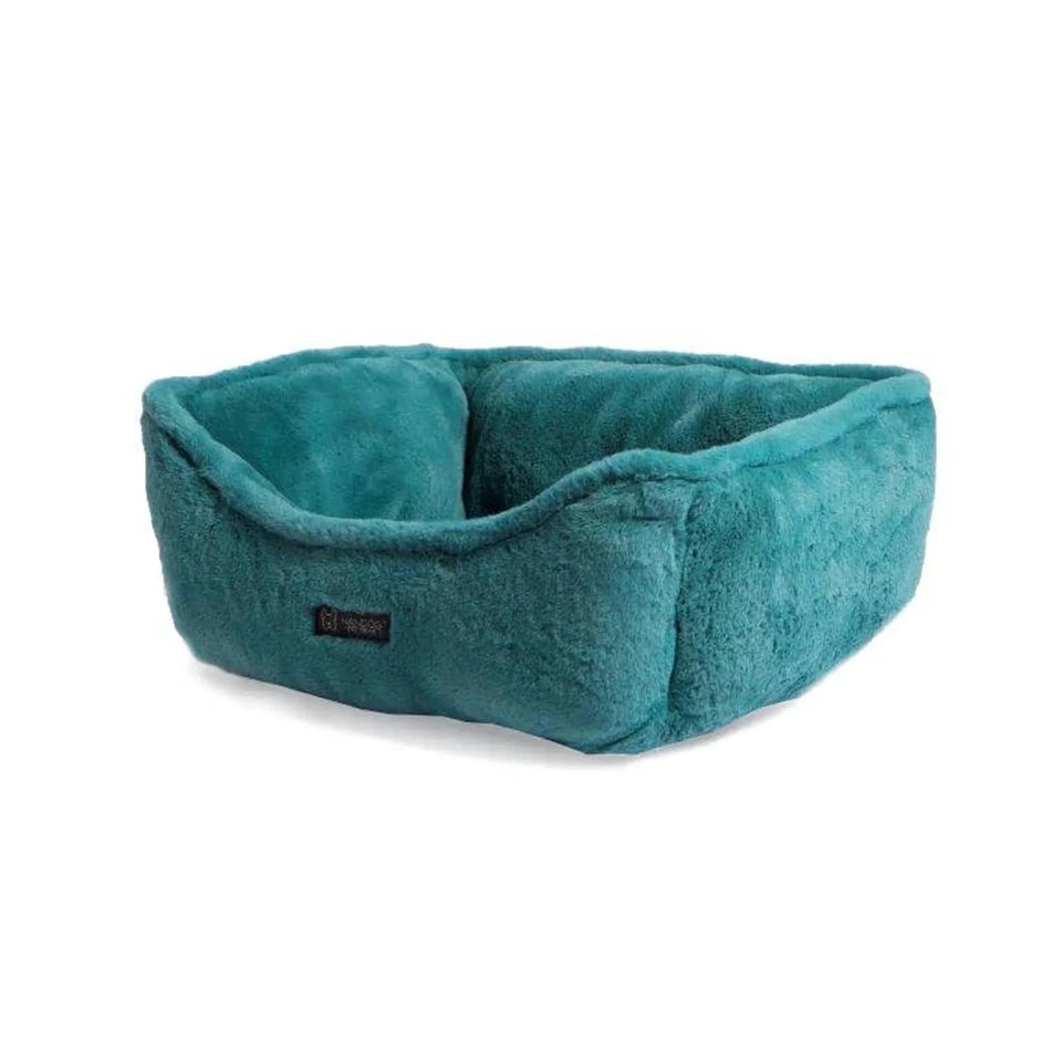 Teal NANDOG Cloud reversible pet bed with plush channel stitching, angled view