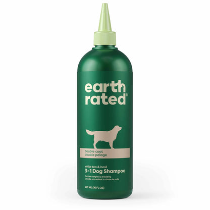 Earth Rated 3 in 1 Dog Shampoo Double Coat 16oz green bottle with dog silhouette for double coat grooming