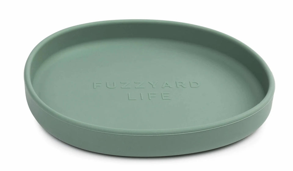 Sage green FuzzYard Life shallow silicone cat dish, angled front view