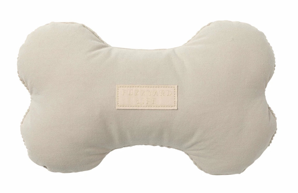 Light gray FuzzYard Life bone-shaped plush dog toy, front view