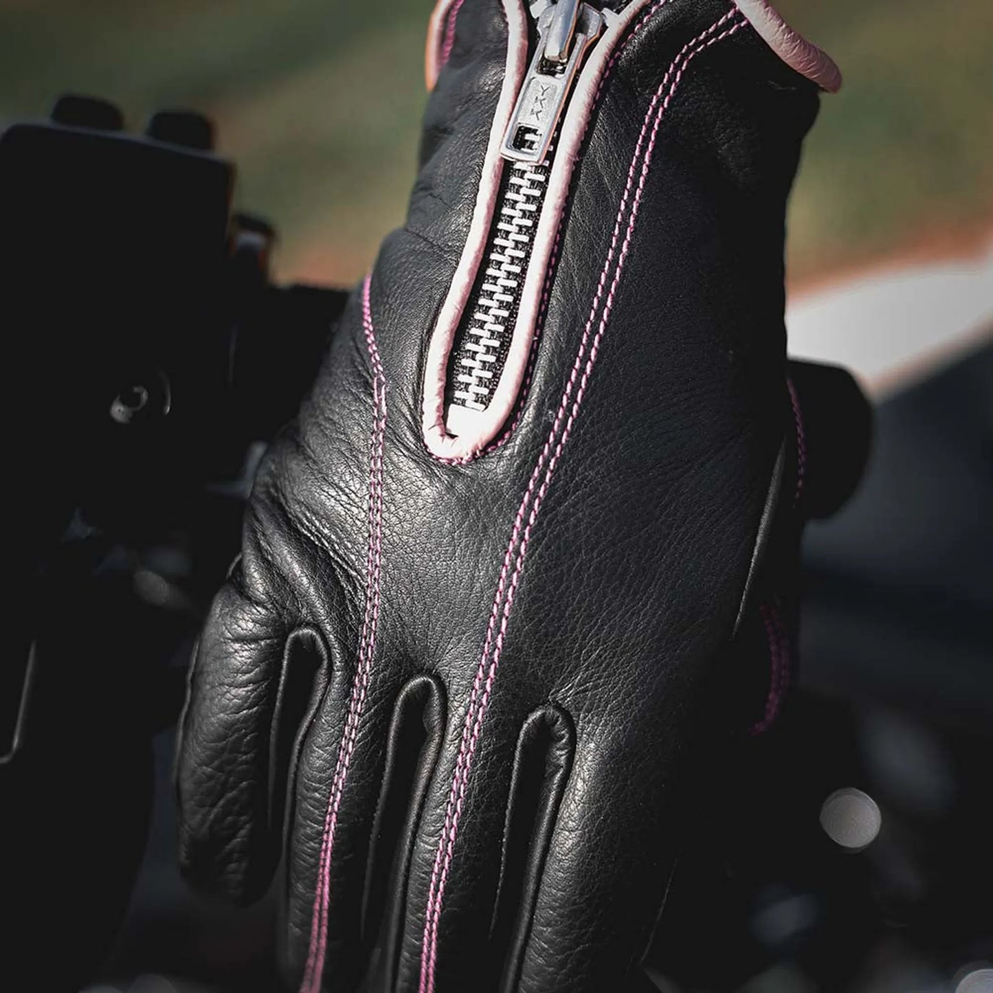 8261.17 - Ladies Full Finger Gloves in black leather with pink stitching and zipper detail for style and comfort