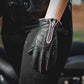 8261.17 - Ladies Full Finger Gloves in black leather with pink stitching and zipper, worn on a hand outdoors