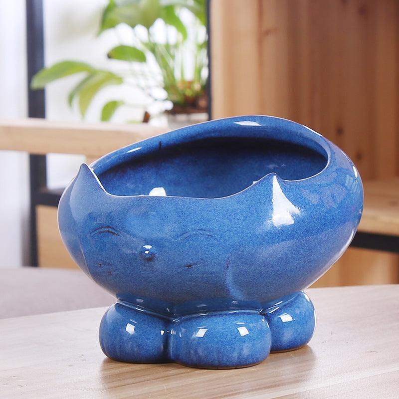 Pet Oasis: Resin Cat Feeder And Water Dispenser - Pets Perfect