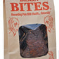 Brown paper bag with window showing dark treats labeled Dr. Becker's BISON Bites free-range bison liver for dogs and cats