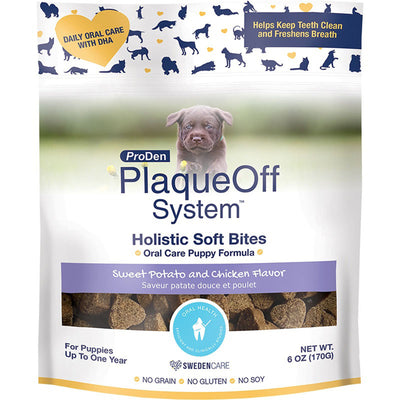 White pouch of ProDen PlaqueOff System Holistic Soft Bites for puppies, with a chocolate lab puppy and kibble visible.