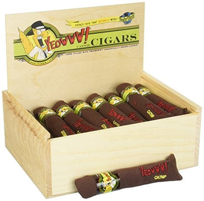 Catnip cigar toys displayed upright in an open wooden counter box