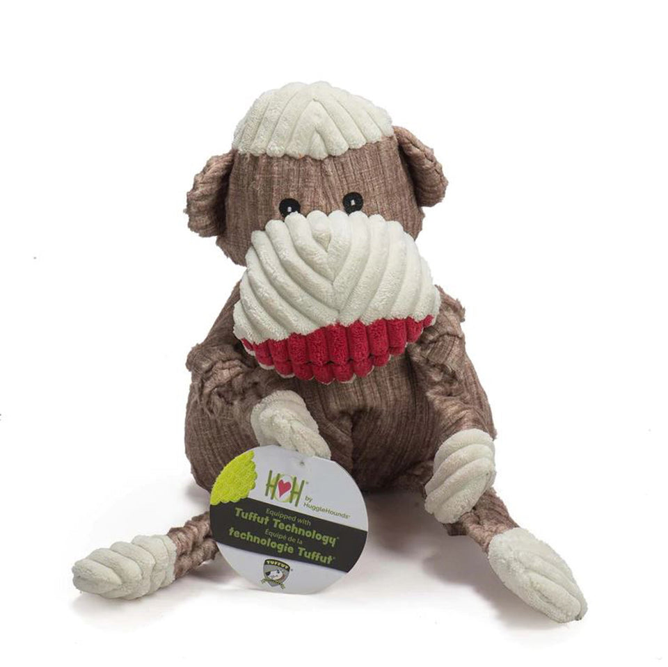 Stuffed sock monkey knottie dog toy sitting upright with a knotted rope tail