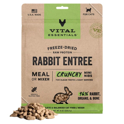 Kraft paper bag of Vital Essentials freeze-dried rabbit cat food, with a pile of mini nibs in front.