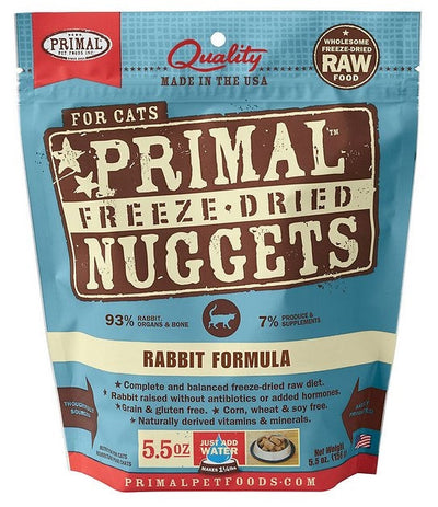 Blue bag of Primal Freeze-Dried Nuggets Rabbit Formula cat food, showing product details and a bowl of rehydrated food.