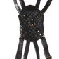 Black quilted leather-style dog harness with adjustable straps and metal D-ring, named Quilt Dog Harness.