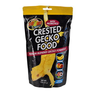 Black pouch of Zoo Med Crested Gecko Food with a yellow gecko, bananas, peaches, and lychee.